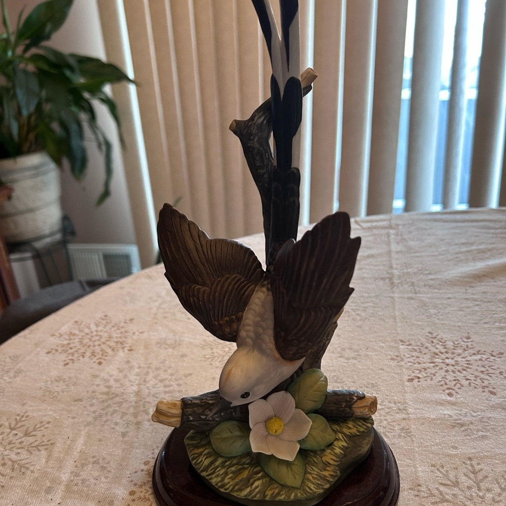 Elegant Bird Sculpture with Floral Detail